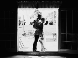 Bride and Groom at Reception by Illinois Wedding Photographer