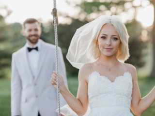 Bride on swing portraits by geneva illinois wedding photographer.