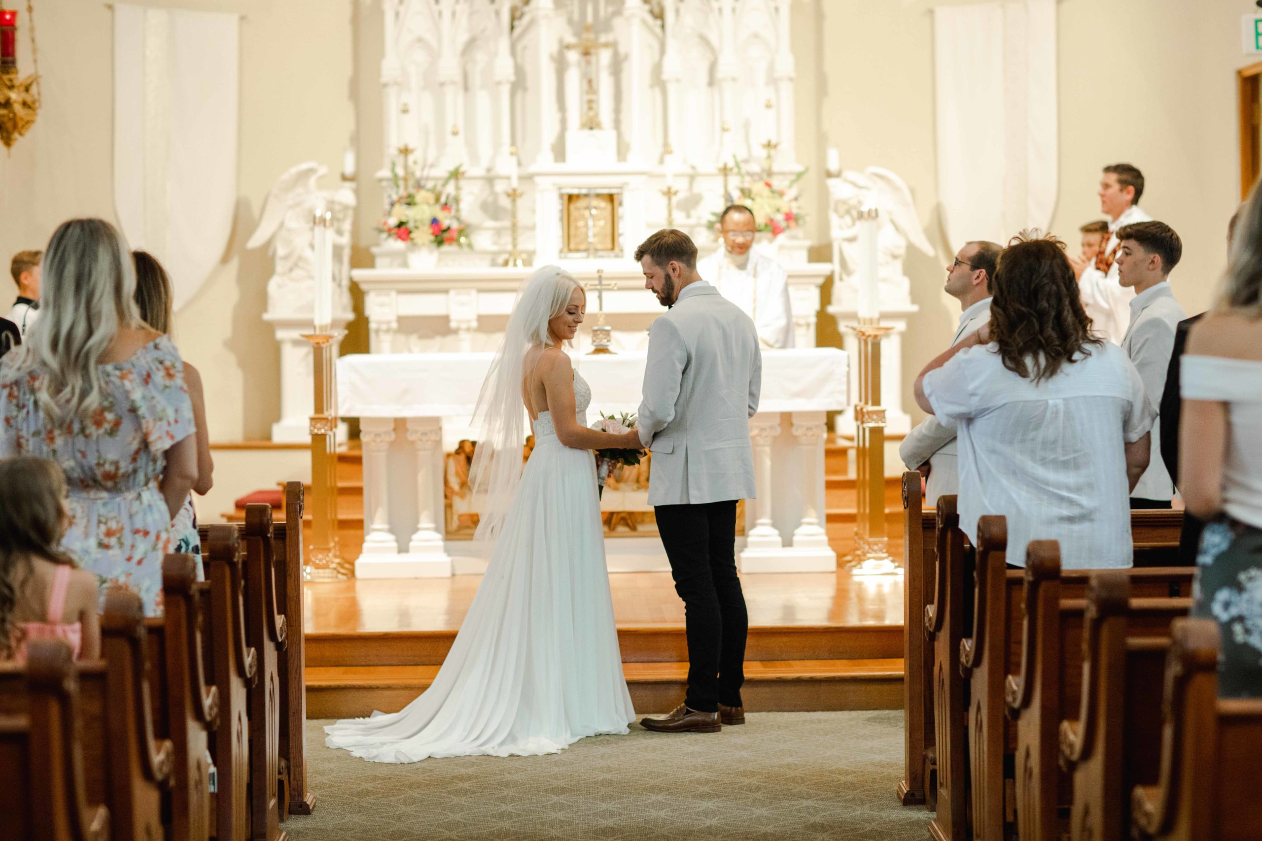 Catholic Church wedding ceremony by Elgin Illinois Wedding Photographer