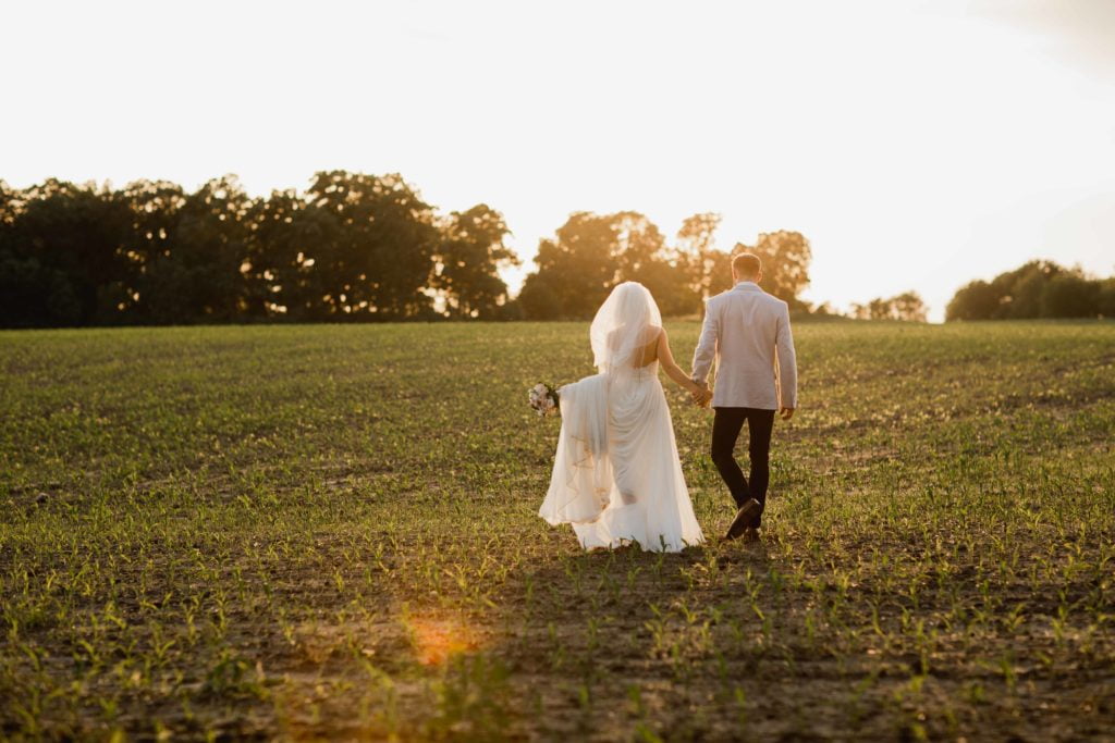 Golden hour in field in Illinois by Geneva Wedding Photographer