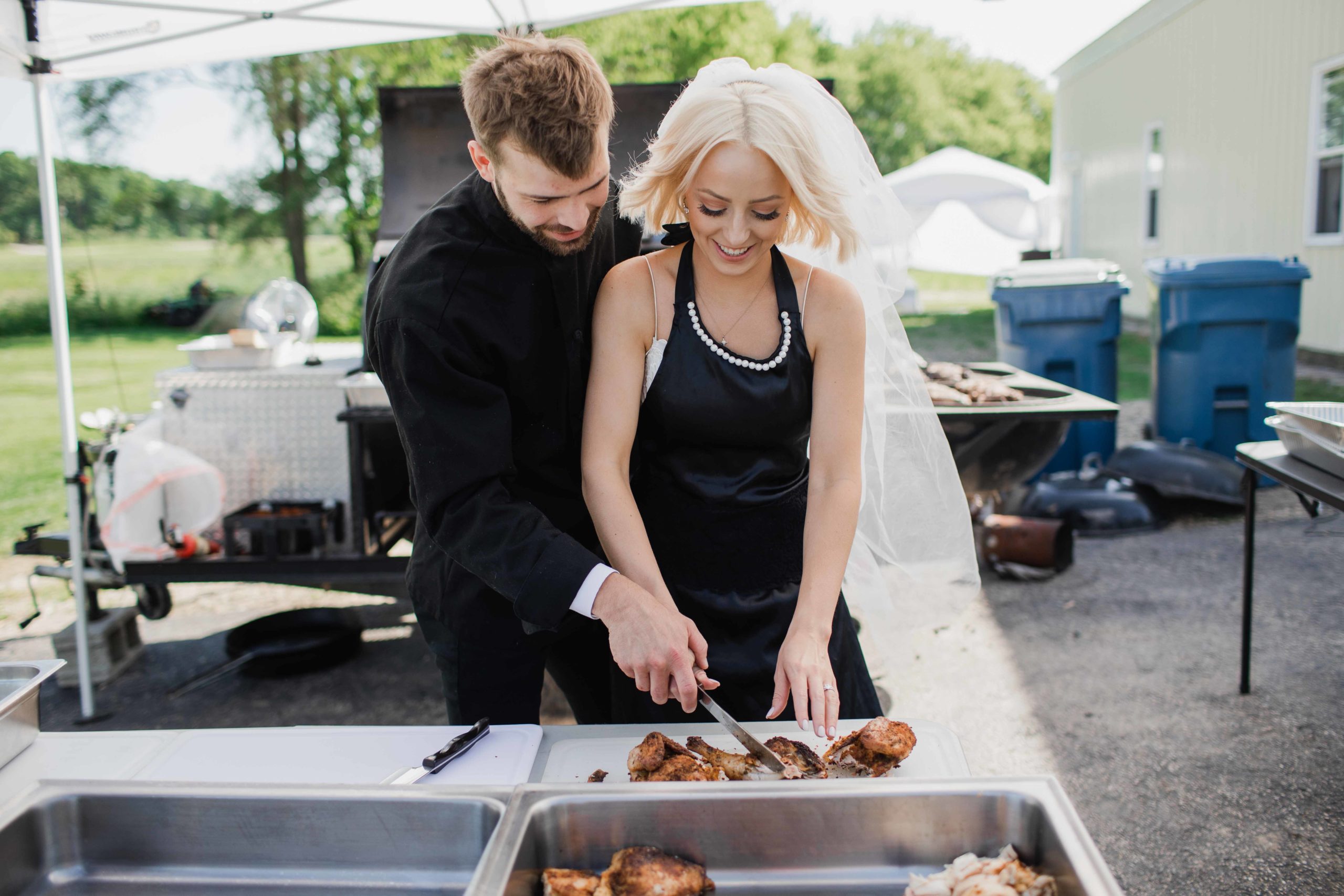 Pit Master Groom and Bride Wedding Reception Photography