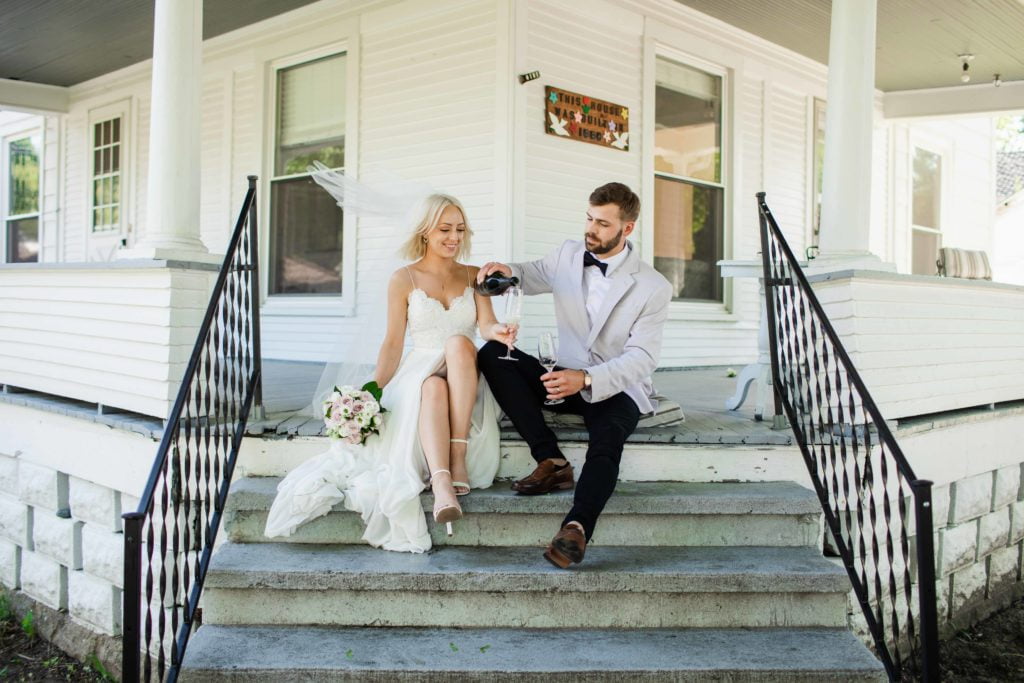 Wedding Photographer in Geneva, Illinois bride and groom on porch