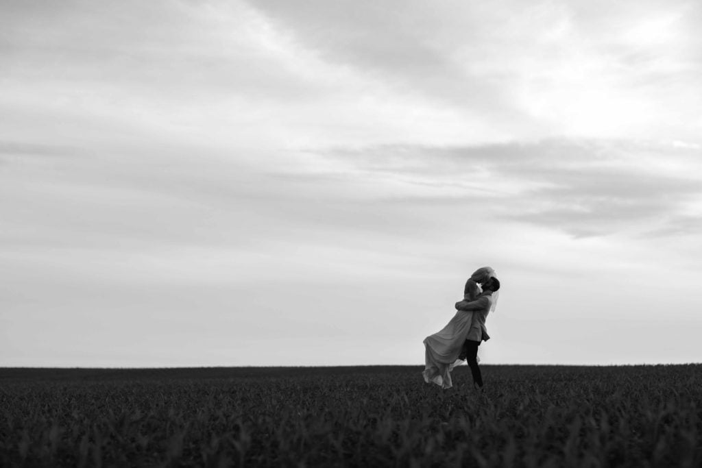 black and white Golden hour in field in Illinois by Geneva Wedding Photographer