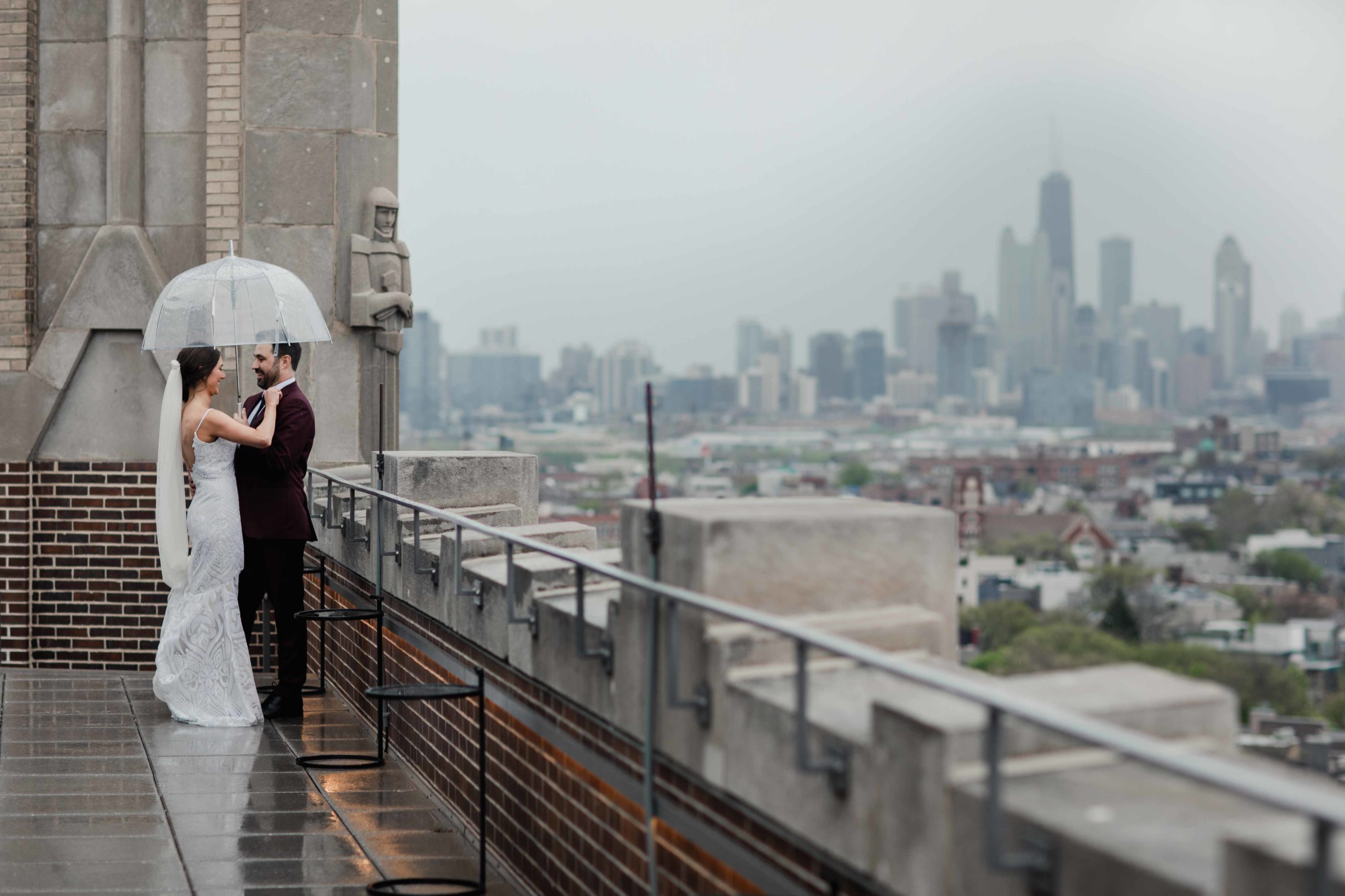 Chicago Illinois Wedding Photography Bride and Groom in rain on the rooftop of The Robey Hotel
