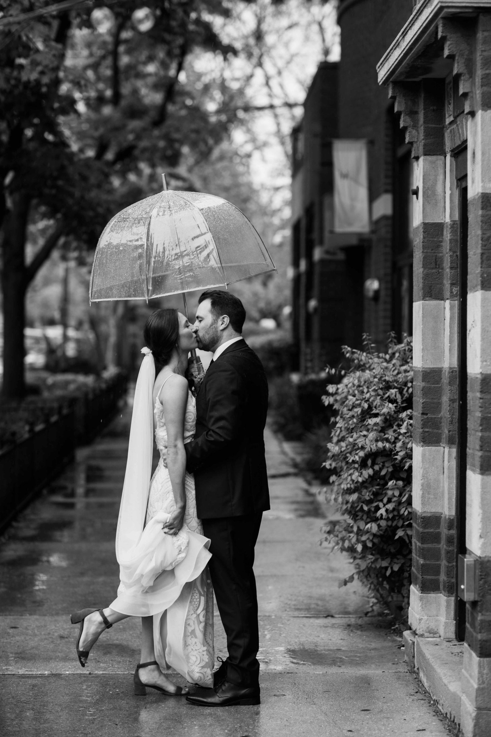 Chicago Illinois Wedding Photography Bride and Groom in the Rain in Wicker Park