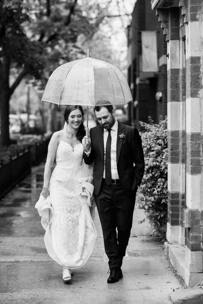 Chicago Illinois Wedding Photography black and white in the rain with umbrella