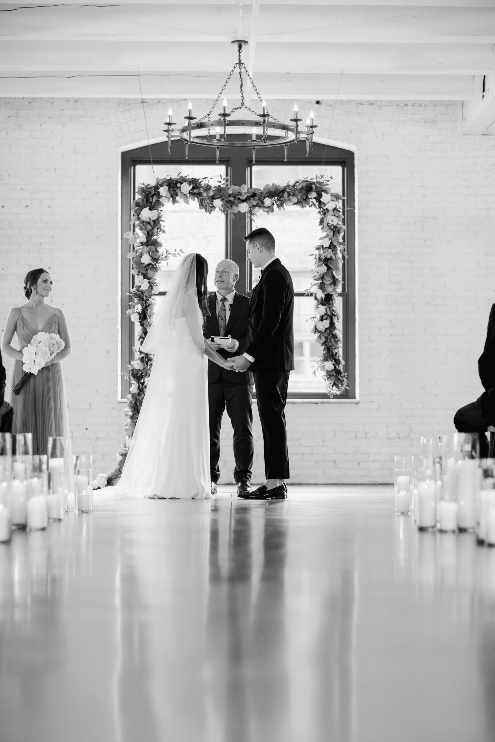 Company 251 Geneva Wedding Photographer Bride and Groom at Ceremony in Black and White