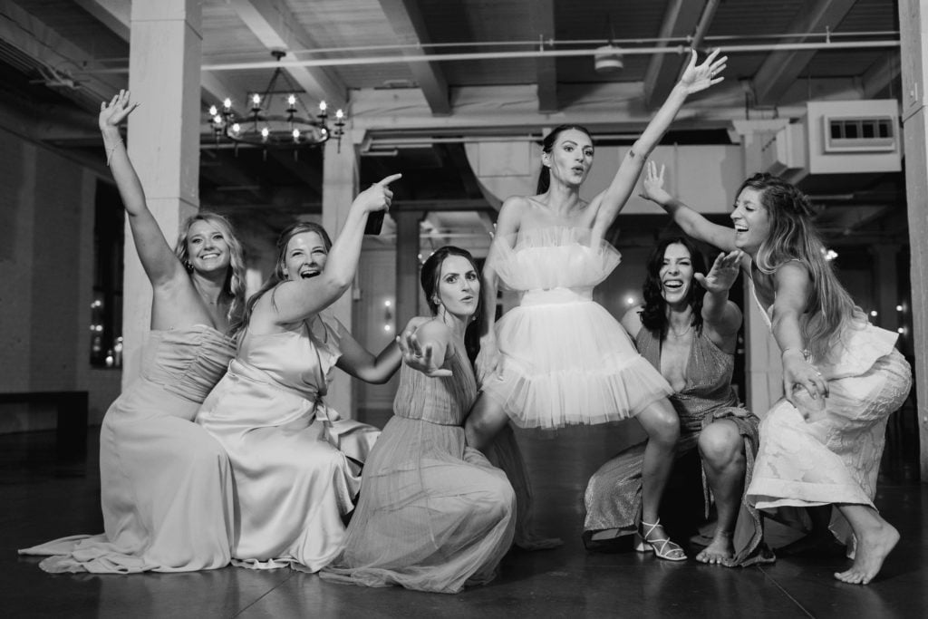 Company 251 Geneva Wedding Photographer black and white of bridesmiads dancing at reception