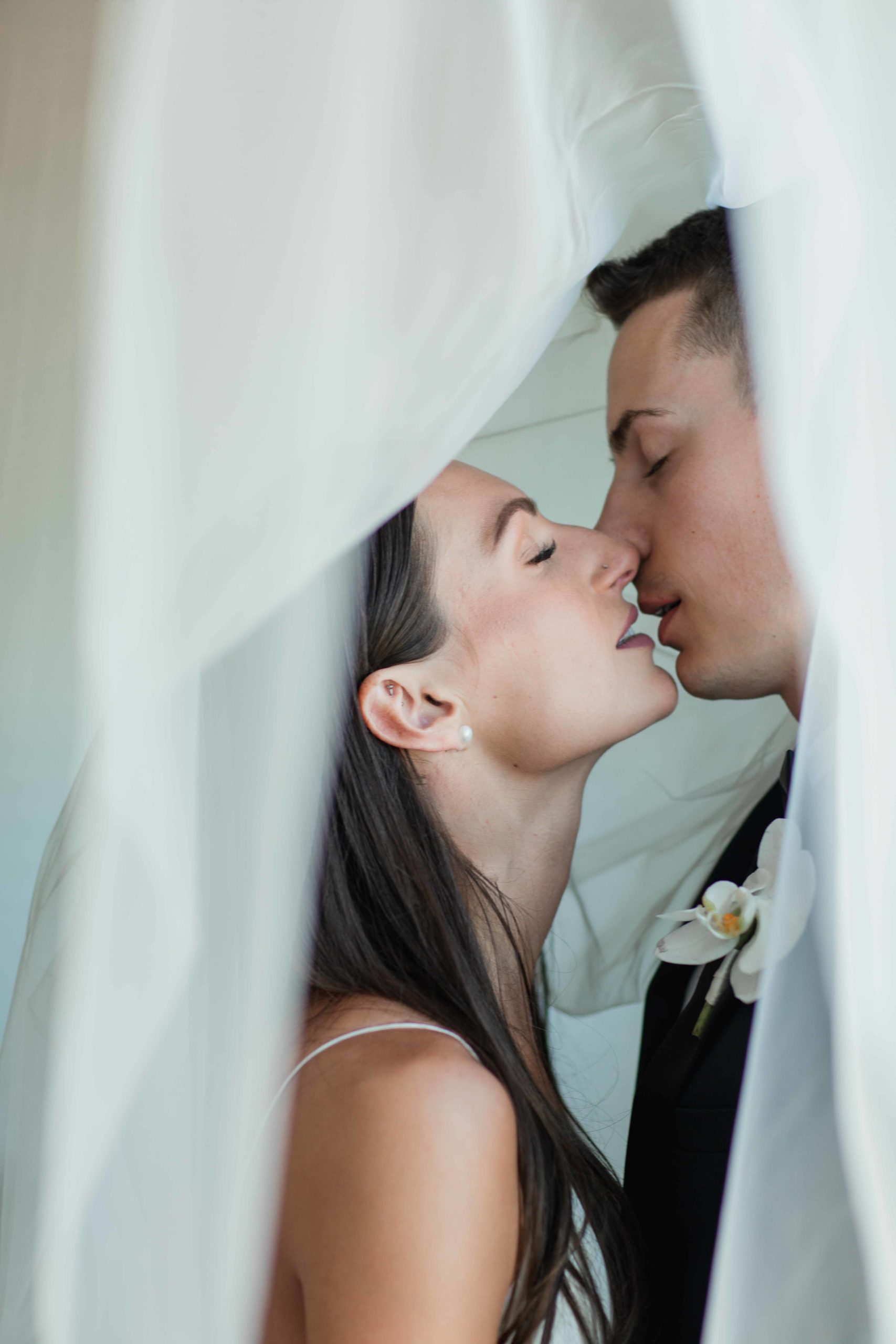 Company 251 Geneva Wedding Photographer bride and groom almost kiss under veil
