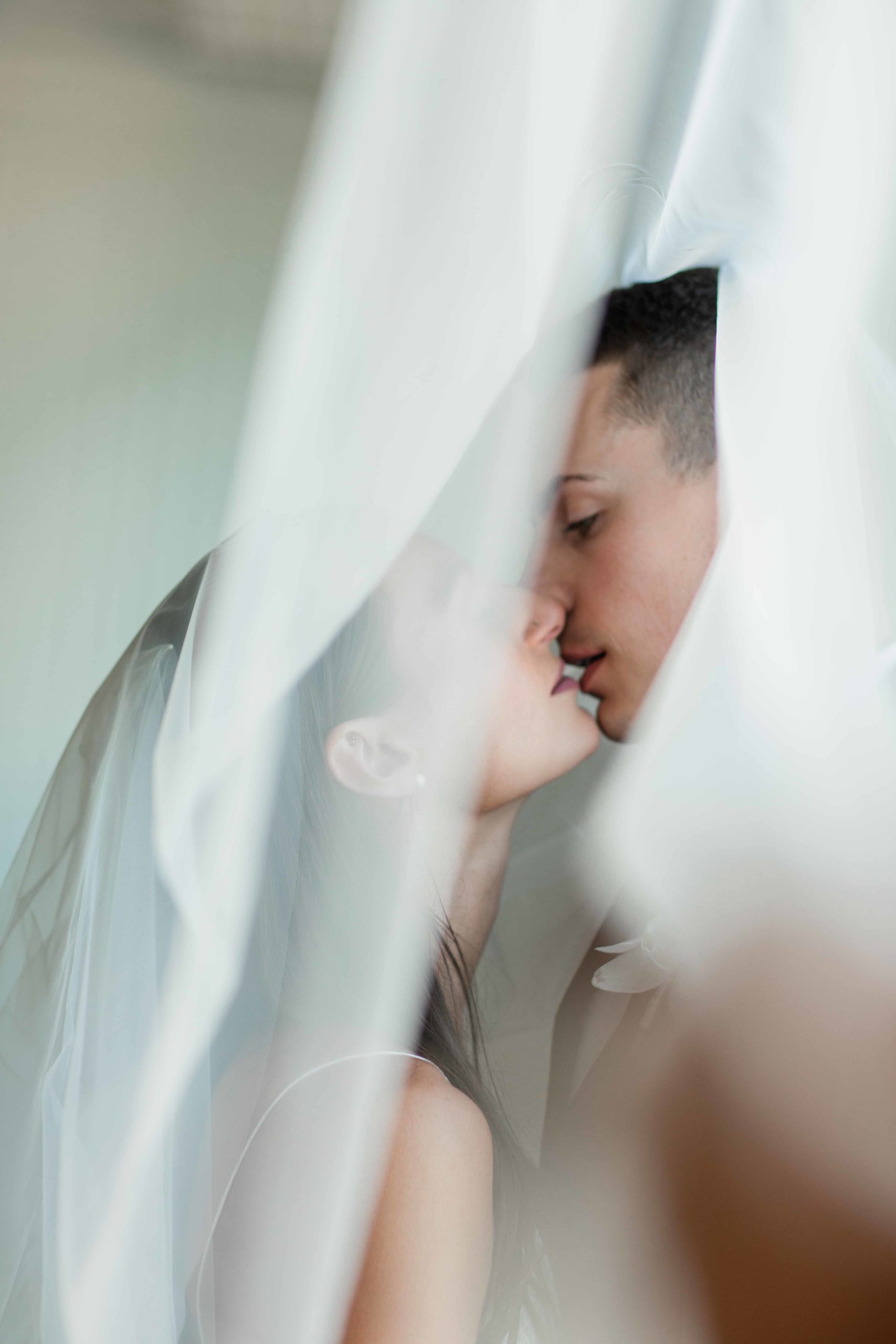 Company 251 Geneva Wedding Photographer bride and groom almost kissing under the veil