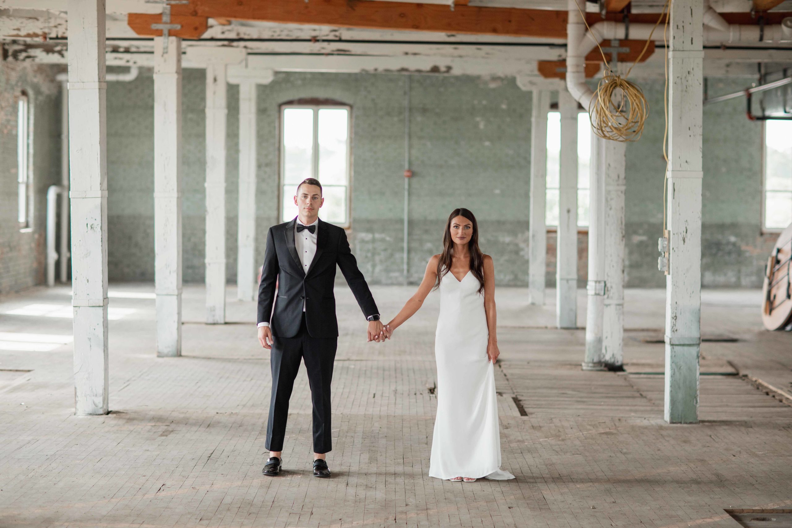 Company 251 Geneva Wedding Photographer bride and groom holding hands in editorial bright and airy photo