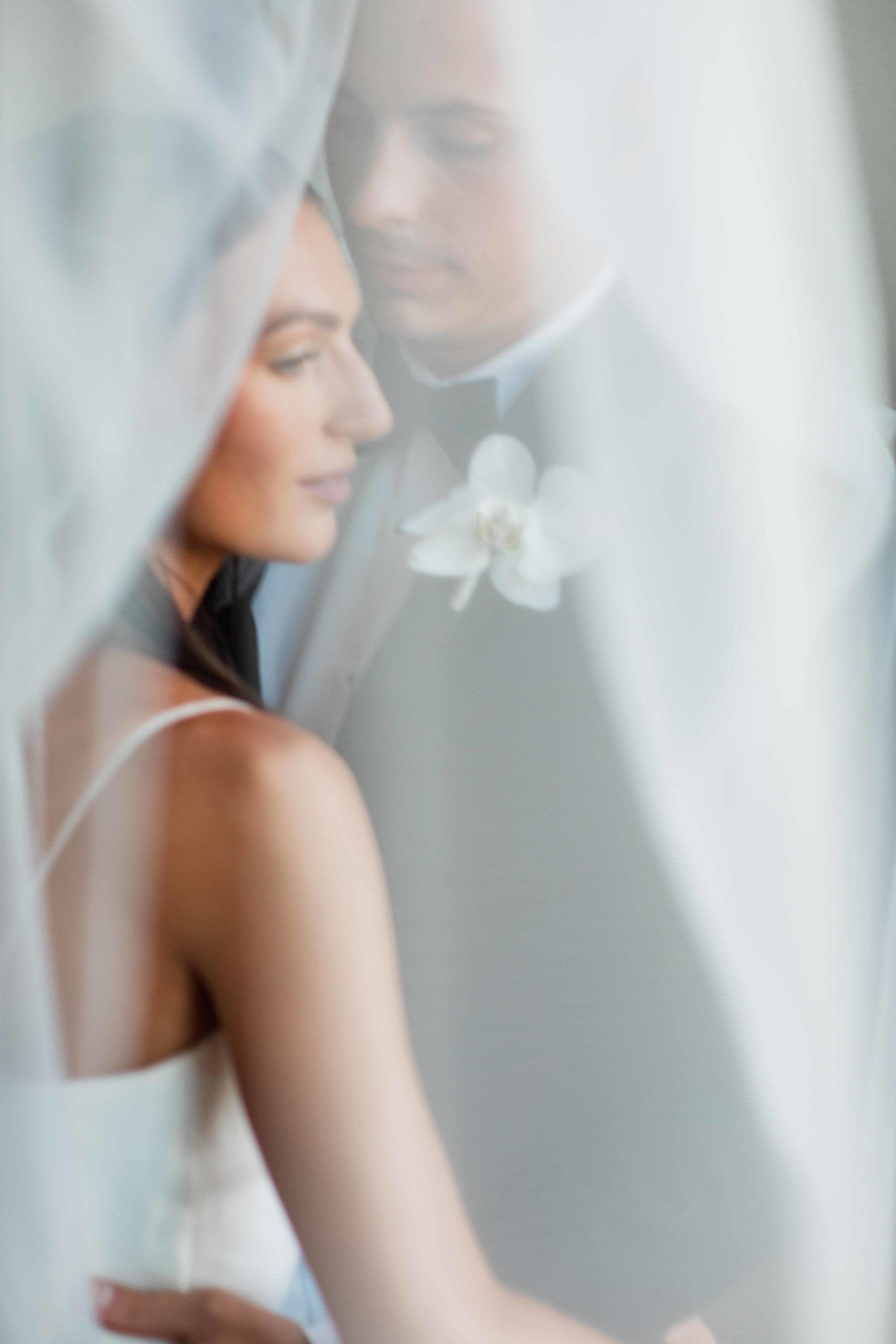 Company 251 Geneva Wedding Photographer bride and groom under the veil editorial soft moment