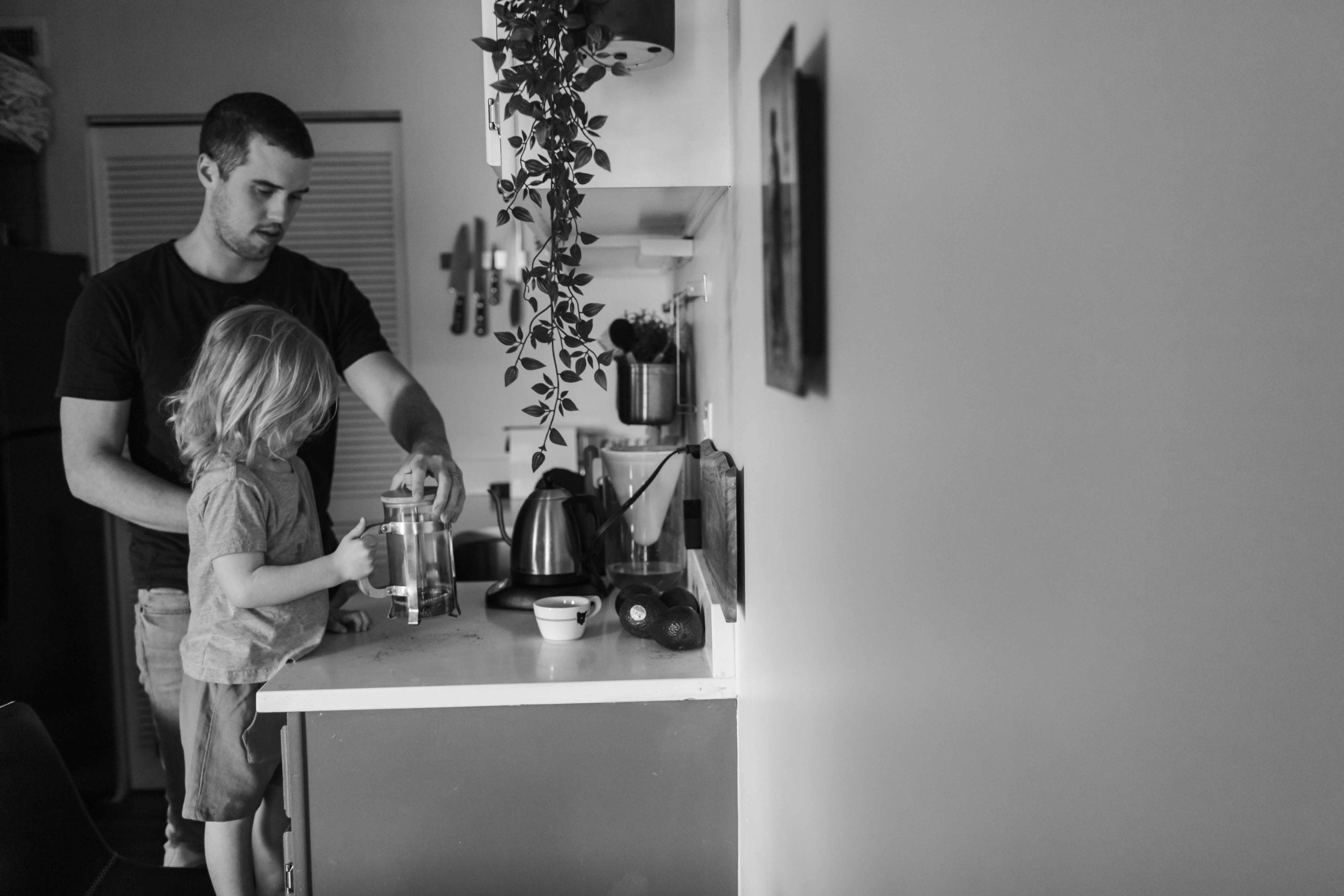 Saint Charles Illinois Family In Home Lifestyle Session making coffee in black and white