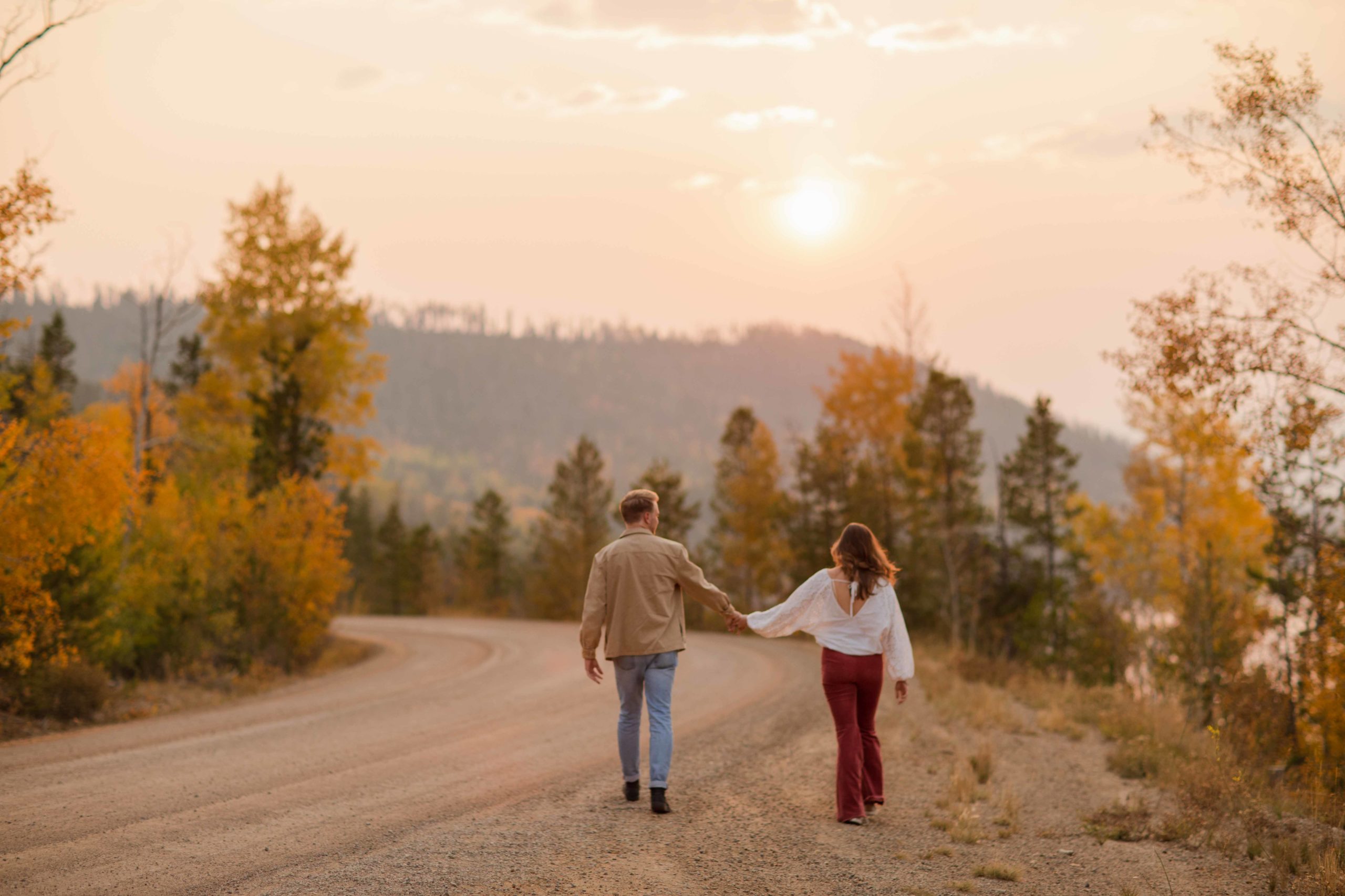 Destination Engagement Photographer in Colorado in the fall yellow aspens golden hour