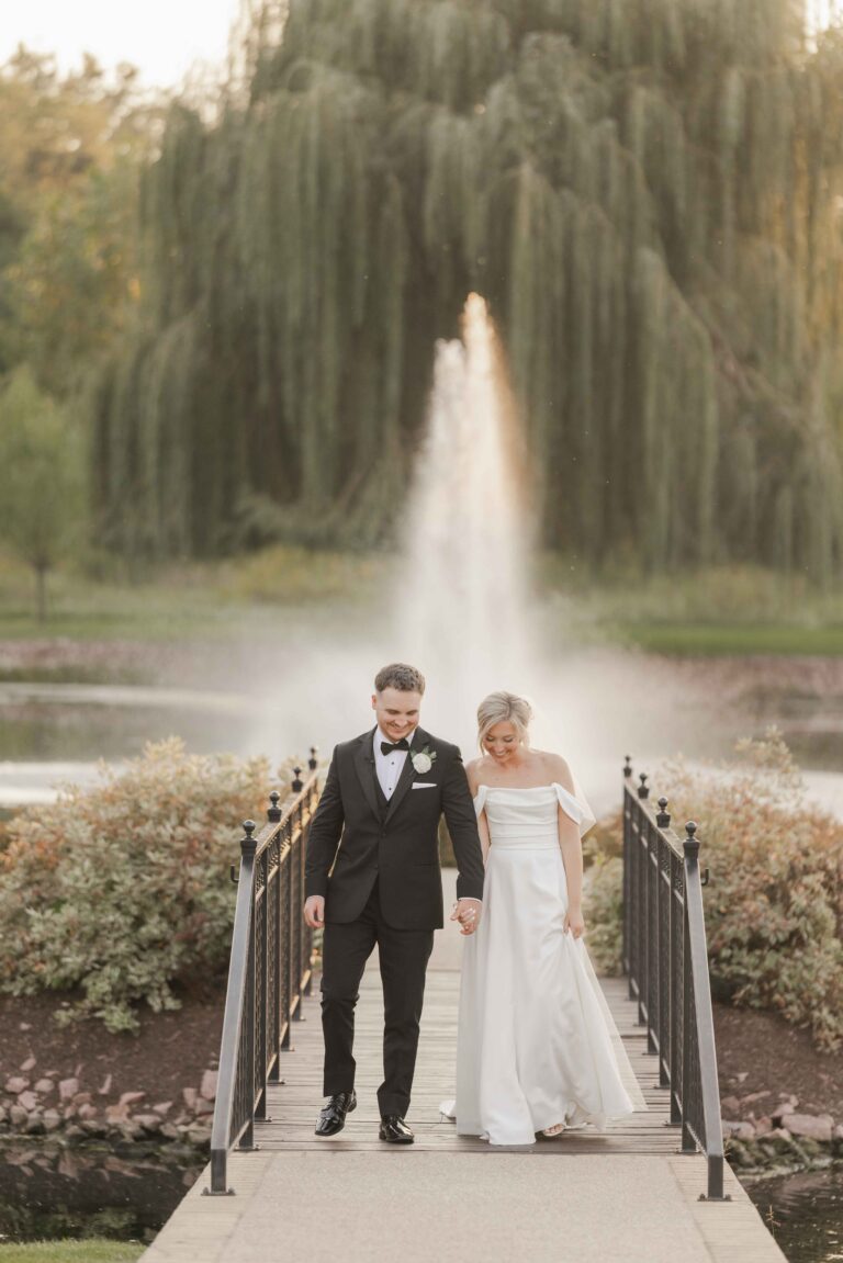 Classic Light Walking Over Bridge The Pavillion at Orchard Ridge Farms Summer Fall September Wedding By Mary Rose Photography-114