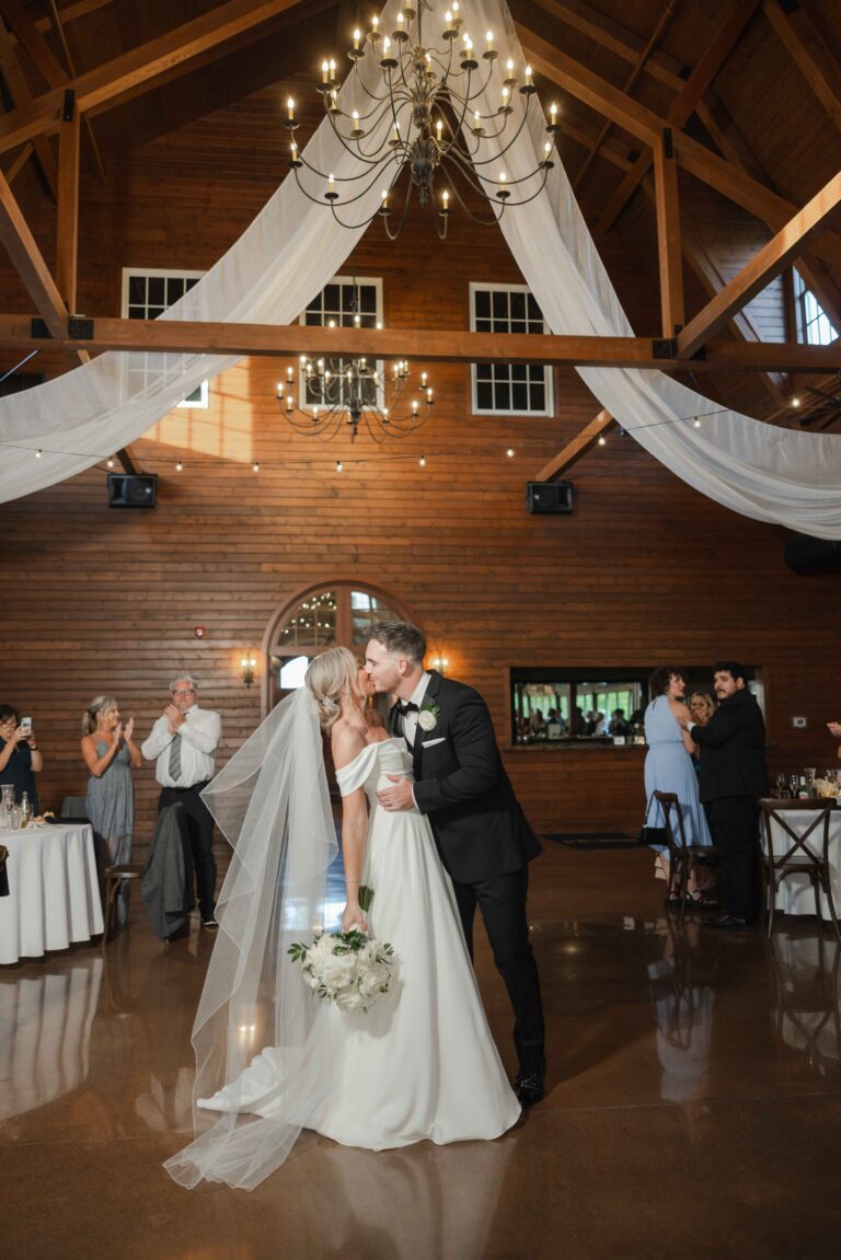 Reception Kiss Soft Bright The Pavillion at Orchard Ridge Farms Summer Fall September Wedding By Mary Rose Photography-76