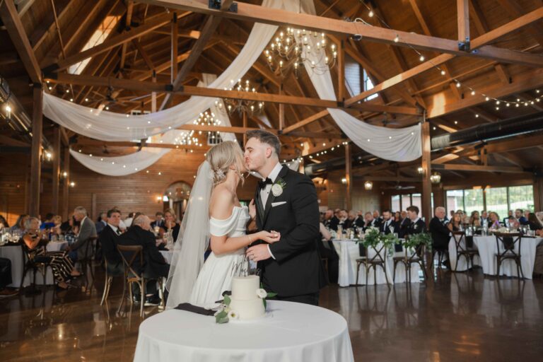 Soft Bright Kissing After Cake The Pavillion at Orchard Ridge Farms Summer Fall September Wedding By Mary Rose Photography-83